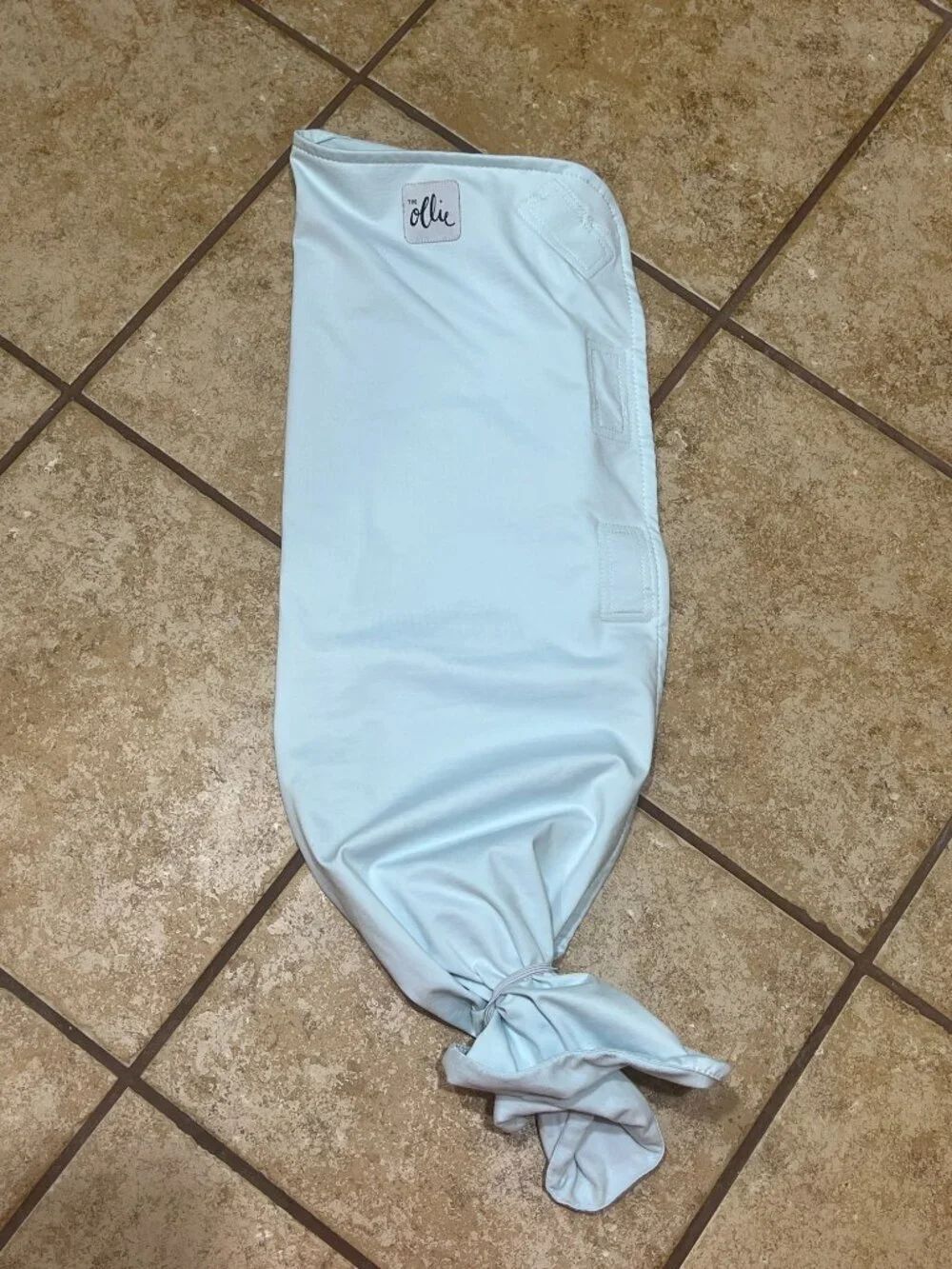 The Ollie World Swaddle in Light Blue